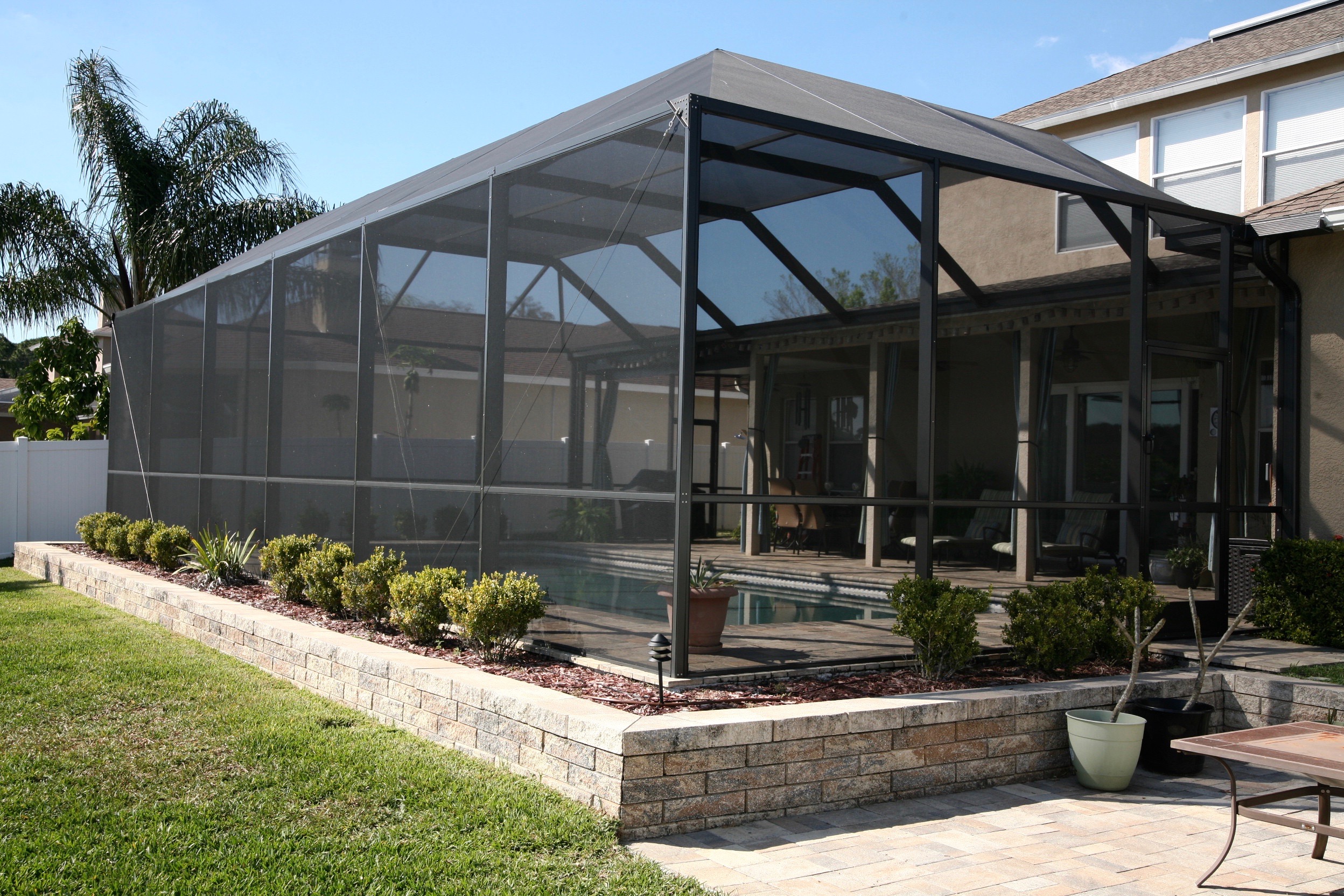 tampapoolenclosure Tropicana Screen & Glass Inc