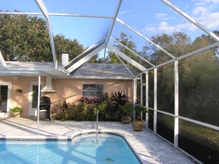 Residential swimming pool with screen enclosure